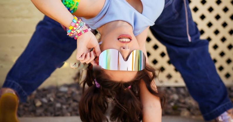 Flexible Itinerary - A woman doing a handstand on the sidewalk