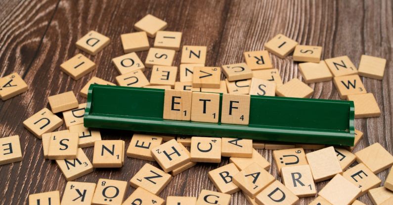 Diversification - The word etf on a wooden board with scrabble tiles