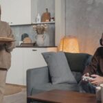 Video Games - Woman Serving Food to a Gamer