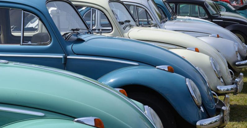 Self-driving Cars - Blue Vintage Cars on a Parking Lot